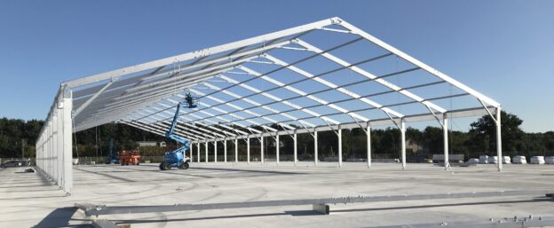 Lauralu steel roof building & solid roof building undergoing construction